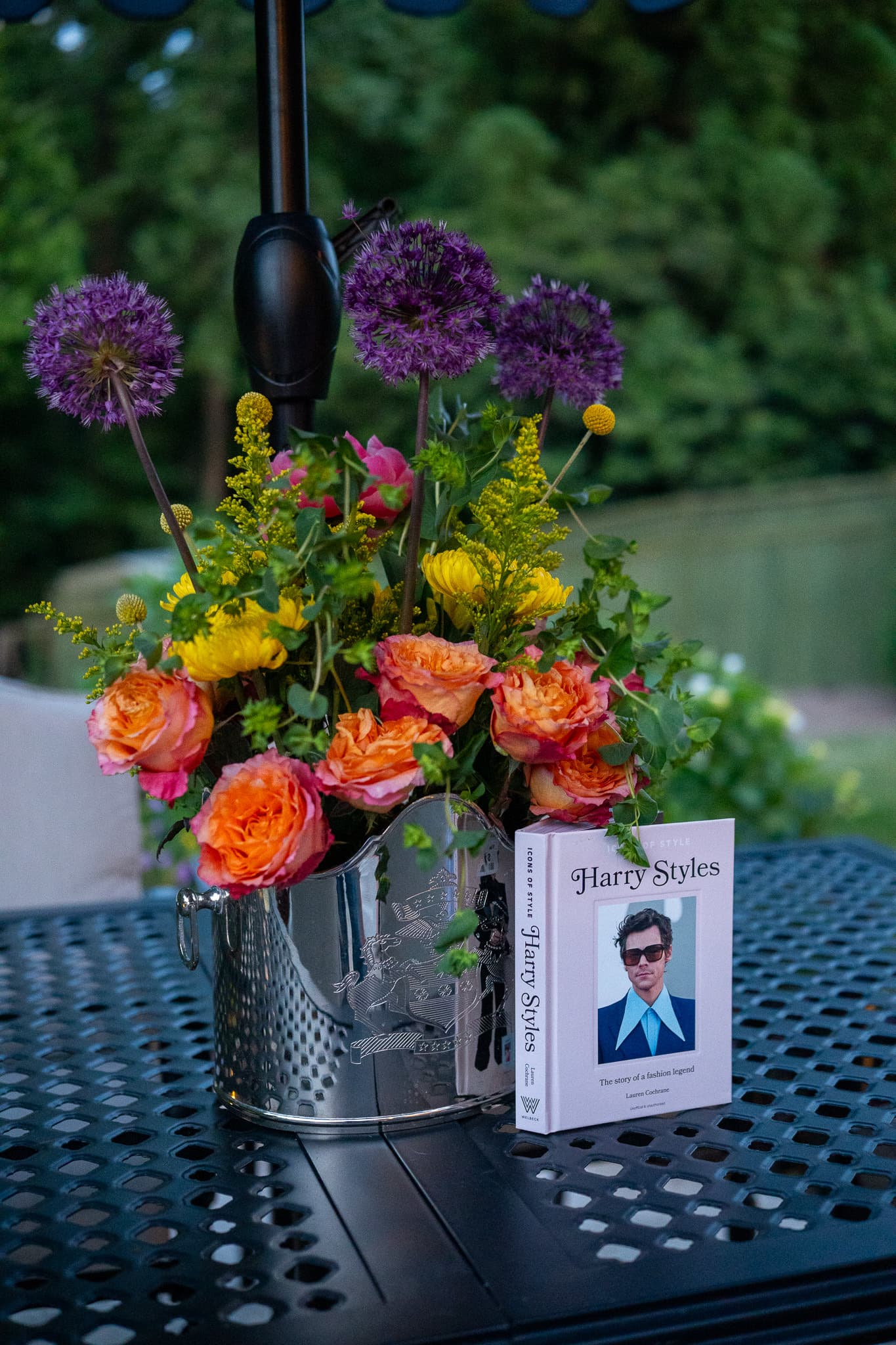 Harry Styles themed floral arrangement in a silver bucket