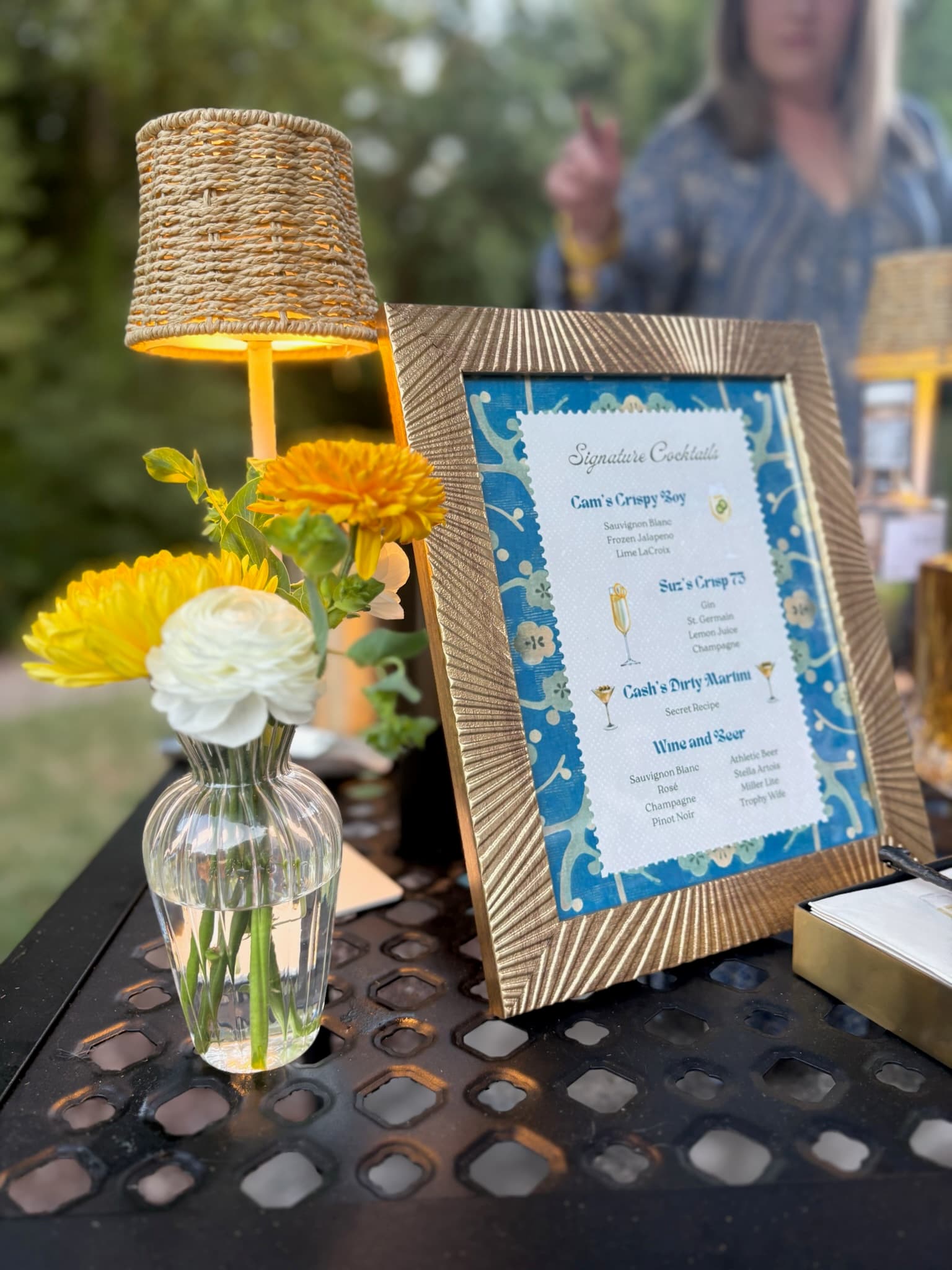 Outdoor cocktail bar with custom signature cocktail menu